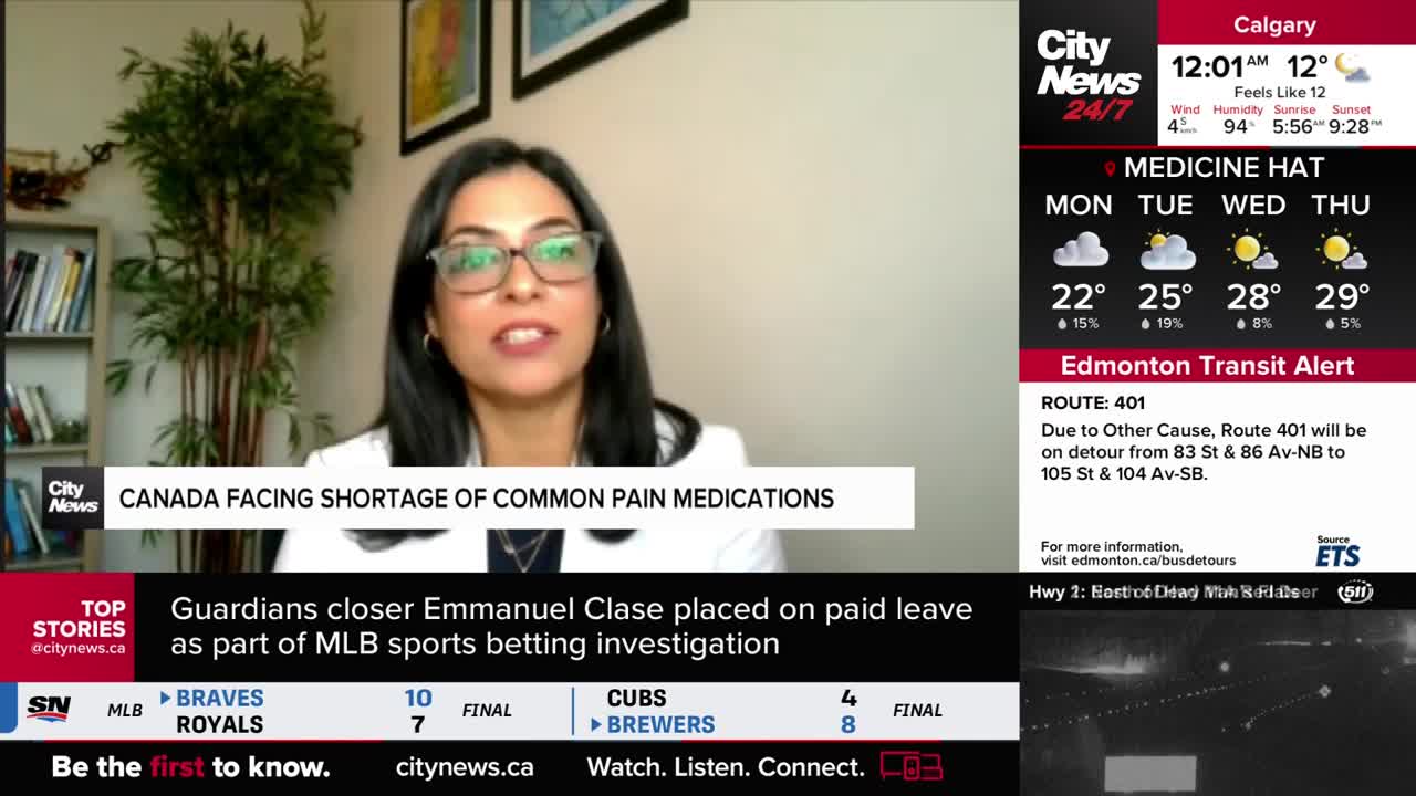 A woman in glasses speaks directly to the camera, framed by the CityNews Calgary logo and a headline about medication shortages in Canada. The bottom of the screen shows sports scores and a transit alert for Edmonton.
