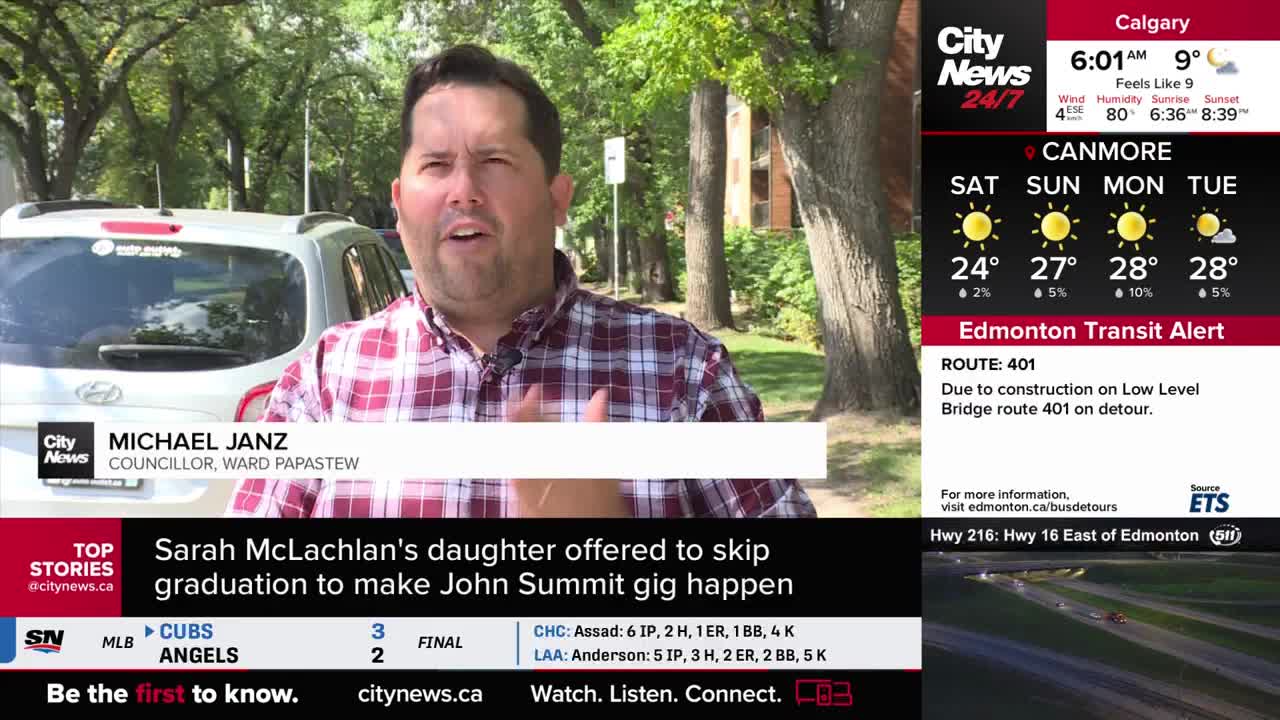 Michael Janz, a CityNews Calgary councillor, is speaking to the camera in front of a car and some trees. The screen displays the weather forecast for Calgary and an Edmonton transit alert.
