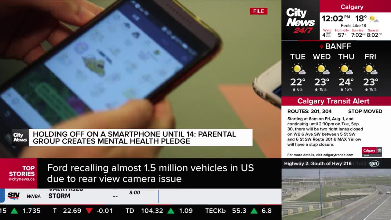A person's hands cradle a smartphone, its screen displaying a colorful app. The CityNews Calgary banner at the bottom highlights a story about parental groups and mental health.
