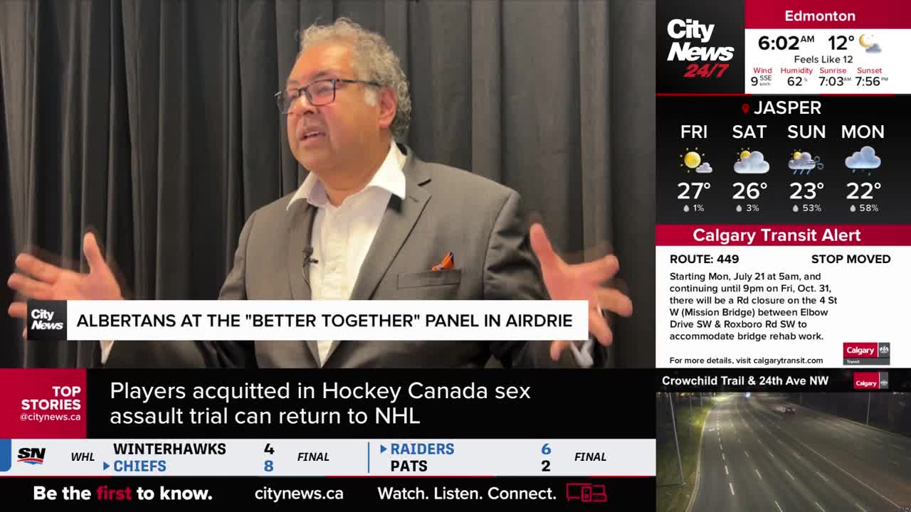 A man in a suit is speaking, gesturing with his hands in front of a black backdrop. The CityNews Calgary graphic shows a news ticker and weather information for Alberta.
