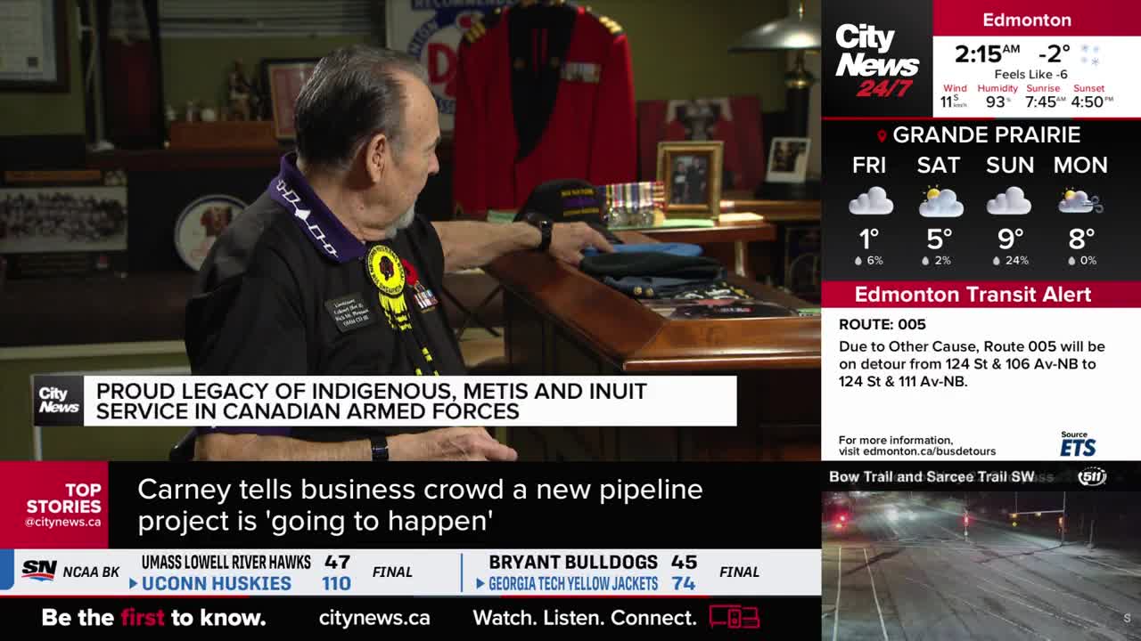 A man in a black shirt gestures toward items on a desk, as a CityNews Calgary graphic highlights a story about Indigenous, Metis, and Inuit service in the Canadian Armed Forces. The Edmonton weather report and transit alerts are visible on the right side of the screen.
A man in a black shirt gestures toward items on a desk, as a CityNews Calgary graphic highlights a story about Indigenous, Metis, and Inuit service in the Canadian Armed Forces. The Edmonton weather report and transit alerts are visible on the right side of the screen.