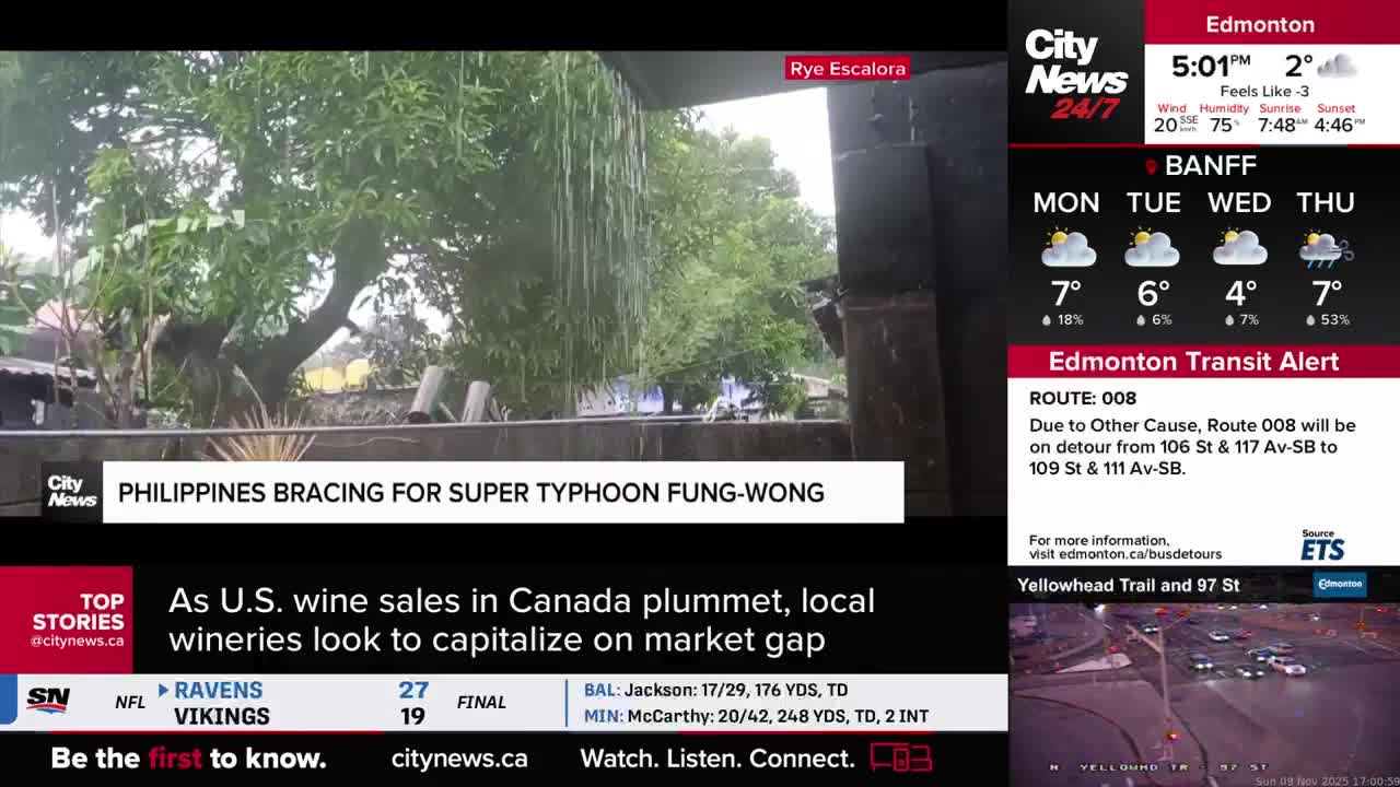 Heavy rain streams down, obscuring the lush green foliage and the dark structure in the background. A CityNews report from the Philippines shows the weather conditions as they brace for a super typhoon.
Heavy rain streams down, obscuring the lush green foliage and the dark structure in the background. A CityNews report from the Philippines shows the weather conditions as they brace for a super typhoon.