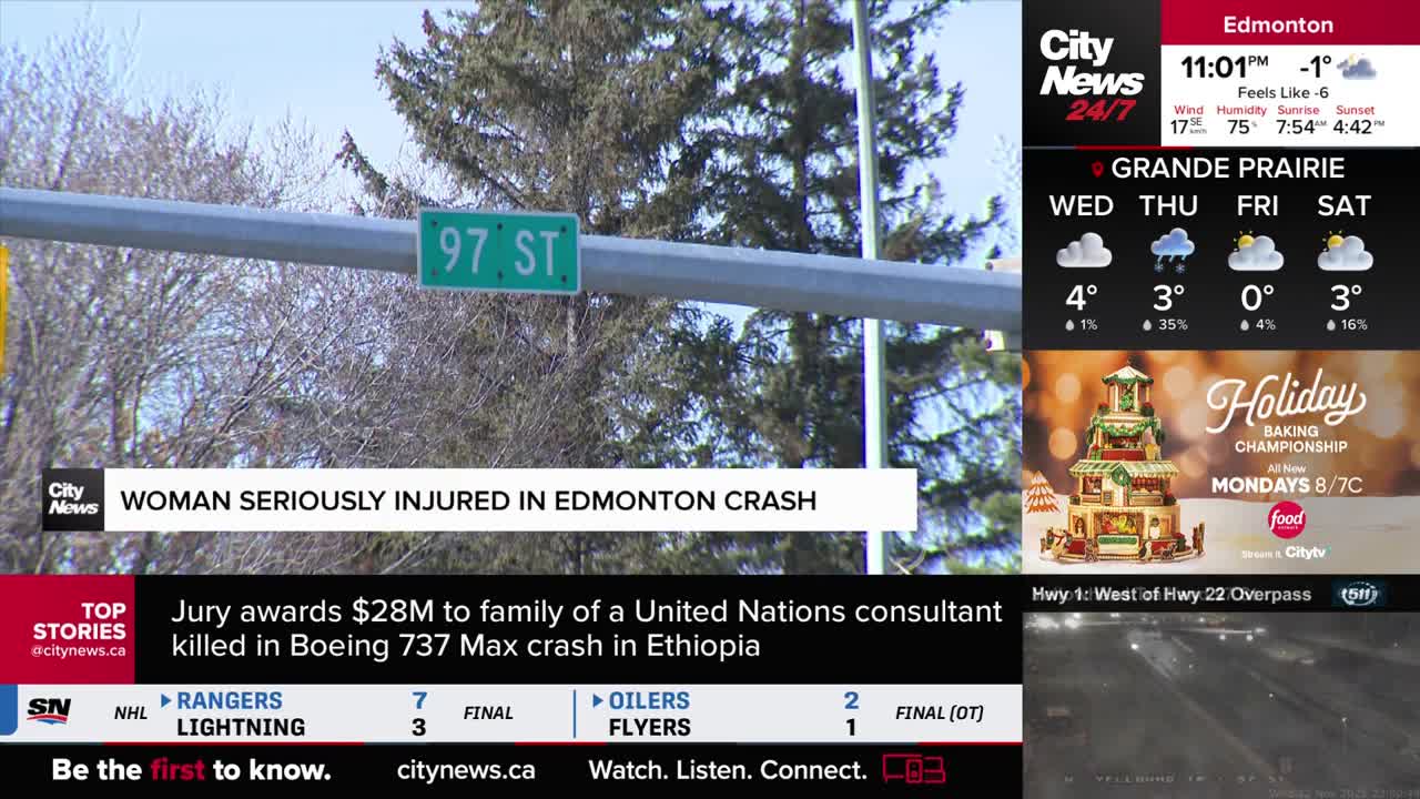 A street sign reading "97 ST" hangs above the frame, and a CityNews graphic reports a woman was seriously injured in an Edmonton crash. The weather forecast for Grande Prairie is displayed on the right side of the screen.
A street sign reading "97 ST" hangs above the frame, and a CityNews graphic reports a woman was seriously injured in an Edmonton crash. The weather forecast for Grande Prairie is displayed on the right side of the screen.