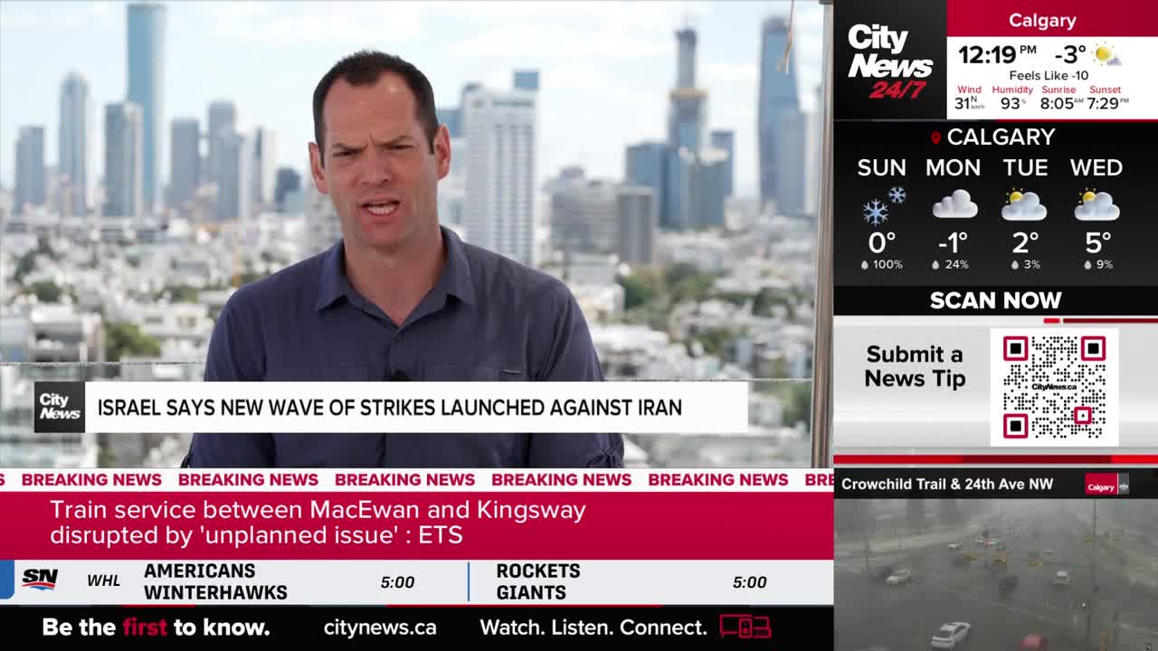 A man in a blue shirt is speaking, with a cityscape behind him. A ticker at the bottom of the screen reads "Train service between MacEwan and Kingsway disrupted by 'unplanned issue': ETS."