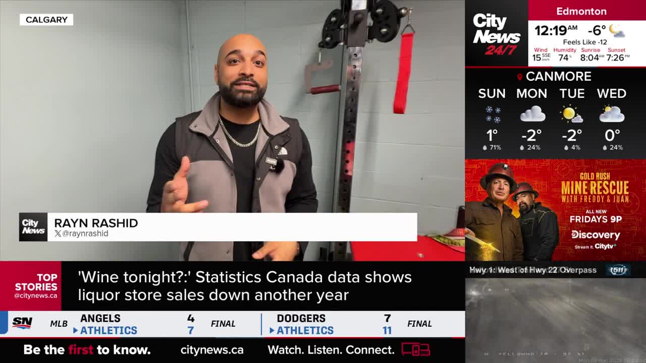 A man in a vest talks with his hands, standing in front of a weight rack. A CityNews Calgary graphic identifies him as Rayn Rashid.