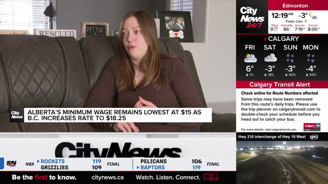 A young woman sits on a couch, speaking about Alberta's minimum wage. The CityNews Calgary screen displays a weather forecast for Calgary, showing cold temperatures and snow.