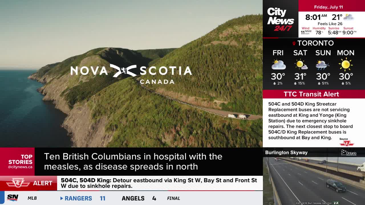 The CityNews Toronto broadcast shows a scenic shot of Nova Scotia, Canada, with a winding road and a couple of trucks visible on the highway. Below, a TTC transit alert warns of streetcar replacement buses due to sinkhole repairs.
