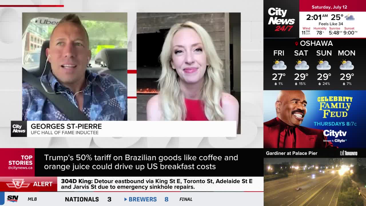 Georges St-Pierre, the UFC Hall of Famer, is speaking from a car, looking directly at the camera for CityNews Toronto. Across from him, a woman in a red top smiles, also on screen, as the weather report for Oshawa displays.
