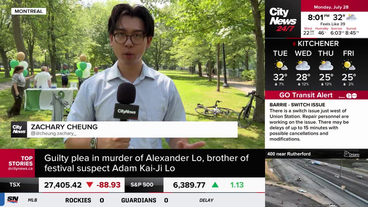 Zachary Cheung from CityNews Toronto is reporting live from a park, speaking directly to the camera with a microphone. Behind him, people gather near a table decorated with green and white.
