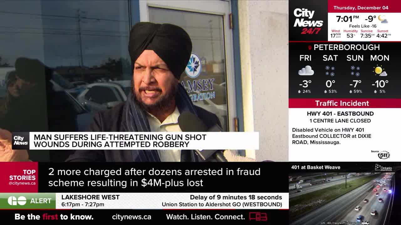 A man with a black turban speaks into a microphone, likely for CityNews Toronto, as a headline about a shooting scrolls beneath him. The weather report shows a cold forecast for Peterborough.
