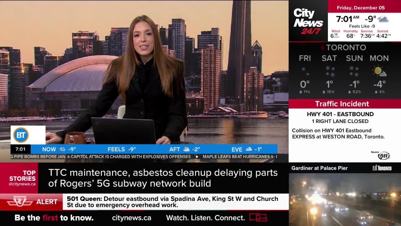 A CityNews Toronto anchor is speaking at a desk, with a Toronto skyline backdrop. Information about the weather and traffic incidents, including a collision on the 401, scrolls across the screen.
