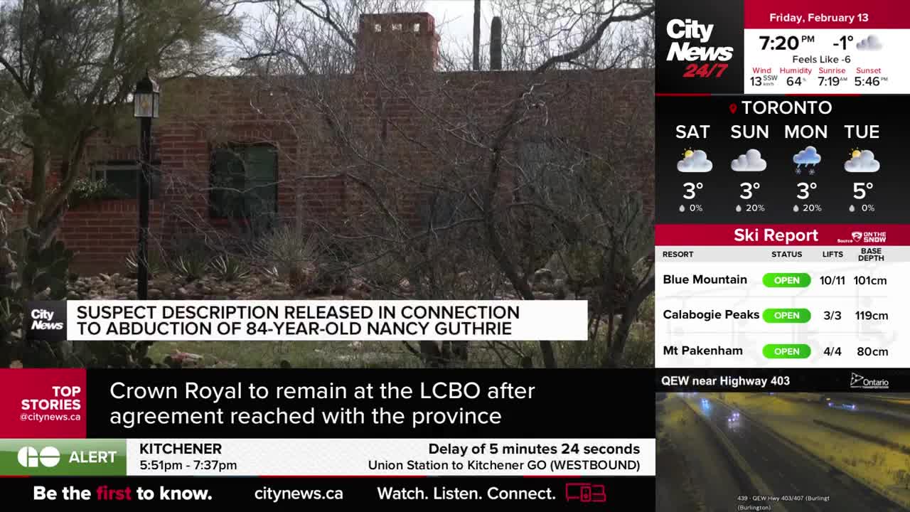 A brick building with dry, sparse vegetation stands in the background. A CityNews banner scrolls across the bottom, reporting on a delay for the Kitchener GO train.