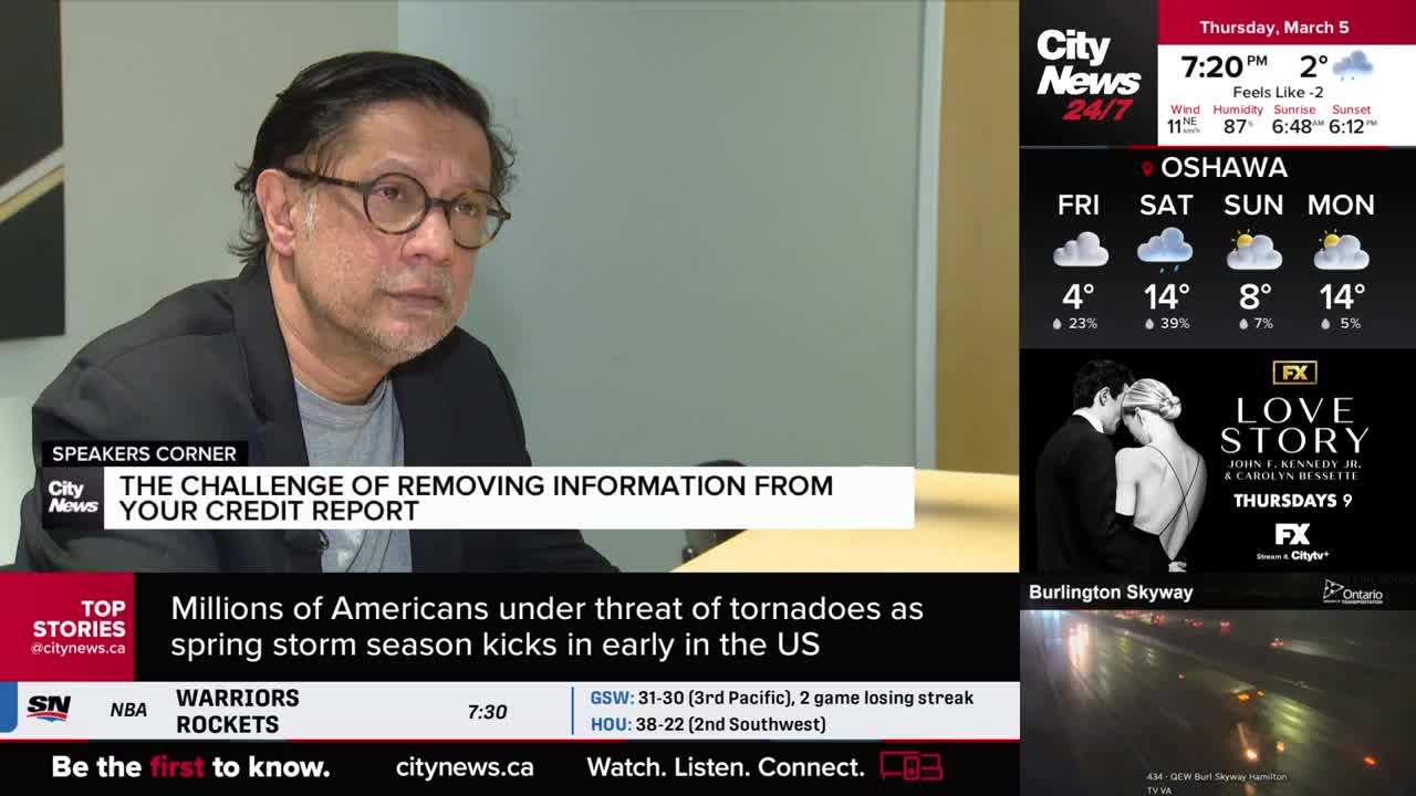 A man with glasses is speaking, his words about credit reports appearing on screen. Outside, a wet highway stretches into the distance under a grey sky.