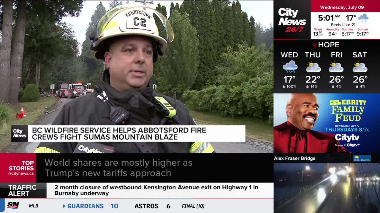 A firefighter in a helmet and uniform speaks to the camera, the "CityNews" logo visible below. Behind him, a fire truck sits on a road lined with trees, as reported by CityNews Vancouver.
