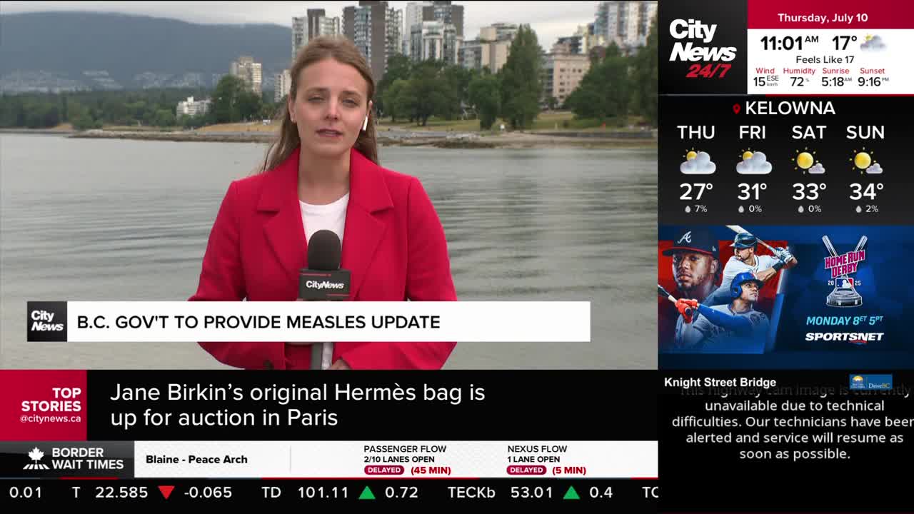 A CityNews Vancouver reporter in a red blazer stands before a waterfront backdrop, speaking into a microphone. The broadcast's graphics display the day's weather, traffic updates, and a headline about a measles update from the B.C. government.
