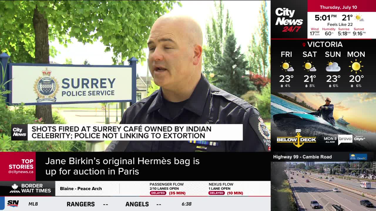 A police officer in uniform is speaking, the "Surrey Police Service" sign visible behind him. CityNews Vancouver's coverage of shots fired at a Surrey café owned by an Indian celebrity is the main story.

