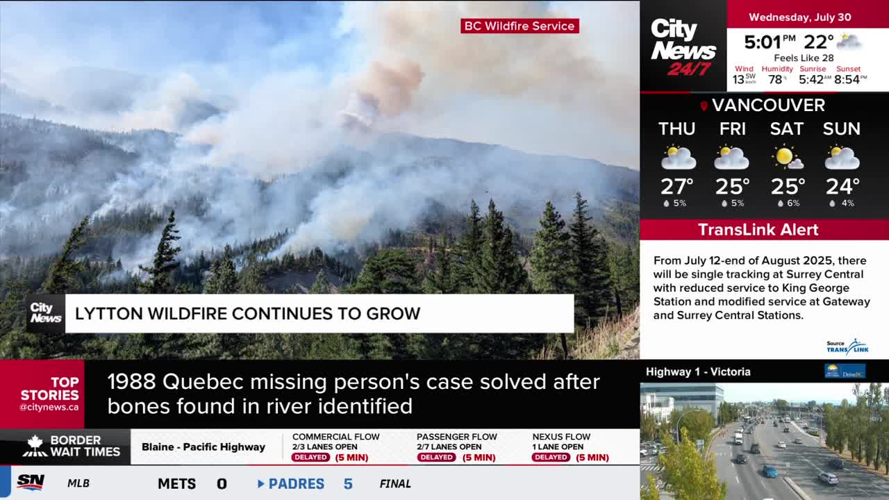Smoke billows from the distant hills, as the Lytton wildfire continues to spread, according to CityNews Vancouver. The BC Wildfire Service is likely battling the blaze, while the city's weather forecast sits in the top right corner.
