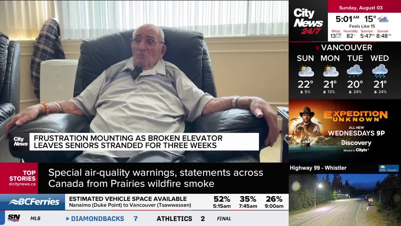 An elderly man sits in a leather chair, the CityNews Vancouver graphic highlighting his story about a broken elevator. The screen also displays the weather forecast for Vancouver and a highway cam.
