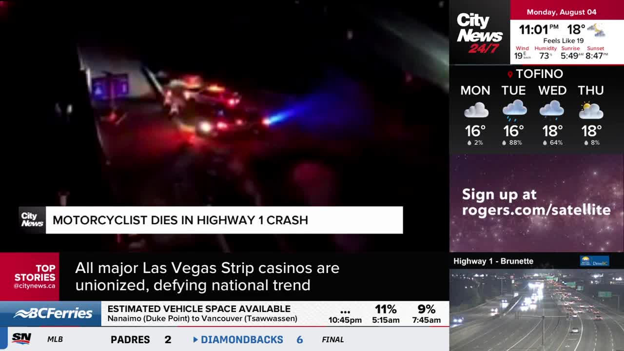 Emergency lights flash in the dark, illuminating what appears to be a crash scene on Highway 1, as reported by CityNews Vancouver. The headline confirms a motorcyclist has died in the accident.

