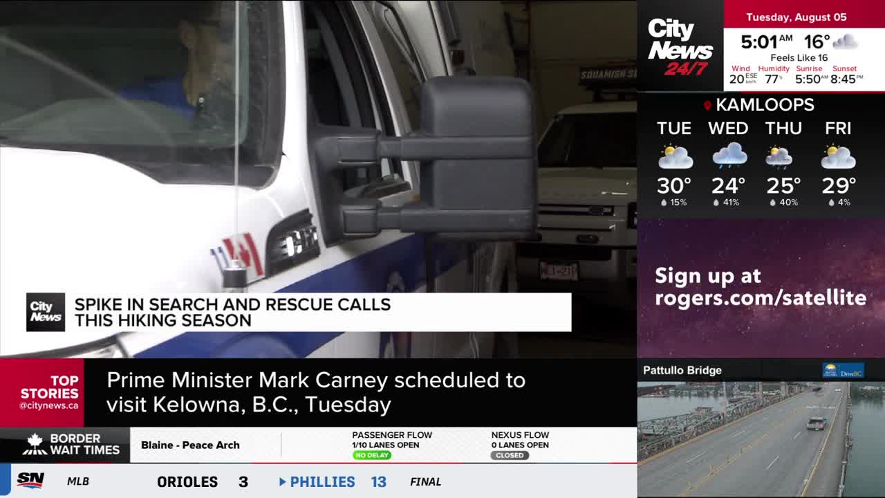 A white truck with a Canadian flag emblem is parked, its side mirror reflecting a second vehicle. CityNews Vancouver is reporting on a spike in search and rescue calls this hiking season.
