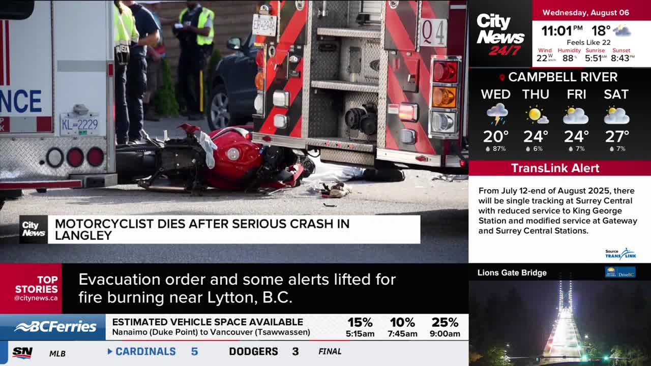 A crumpled red motorcycle lies on the pavement, next to a fire truck. CityNews Vancouver is reporting on the scene, where first responders are present.
