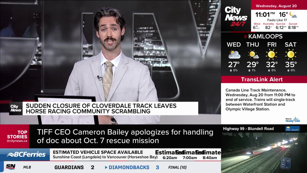 A CityNews Vancouver anchor, in a light-colored suit, is speaking directly to the camera. The screen behind him displays headlines about a track closure and the weather forecast for Kamloops.
