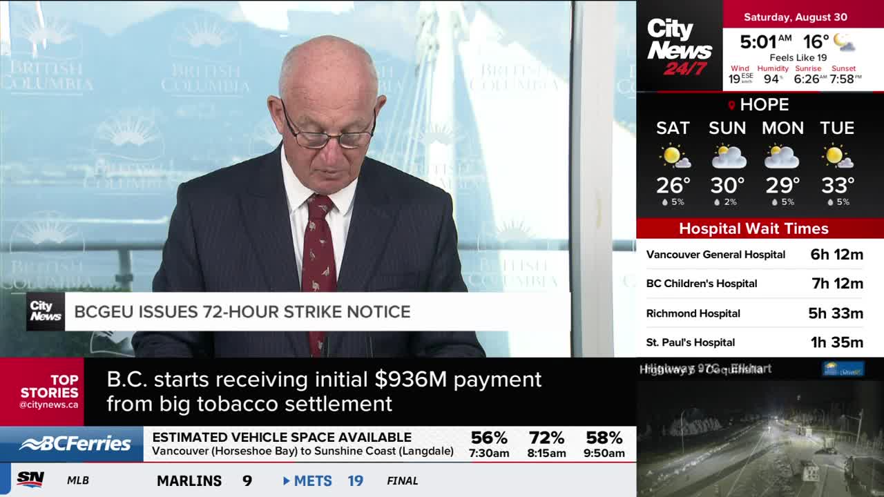 A man in a suit and tie is reading from a script, the CityNews Vancouver logo visible in the corner. Below, a headline notes a 72-hour strike notice from the BCGEU.
