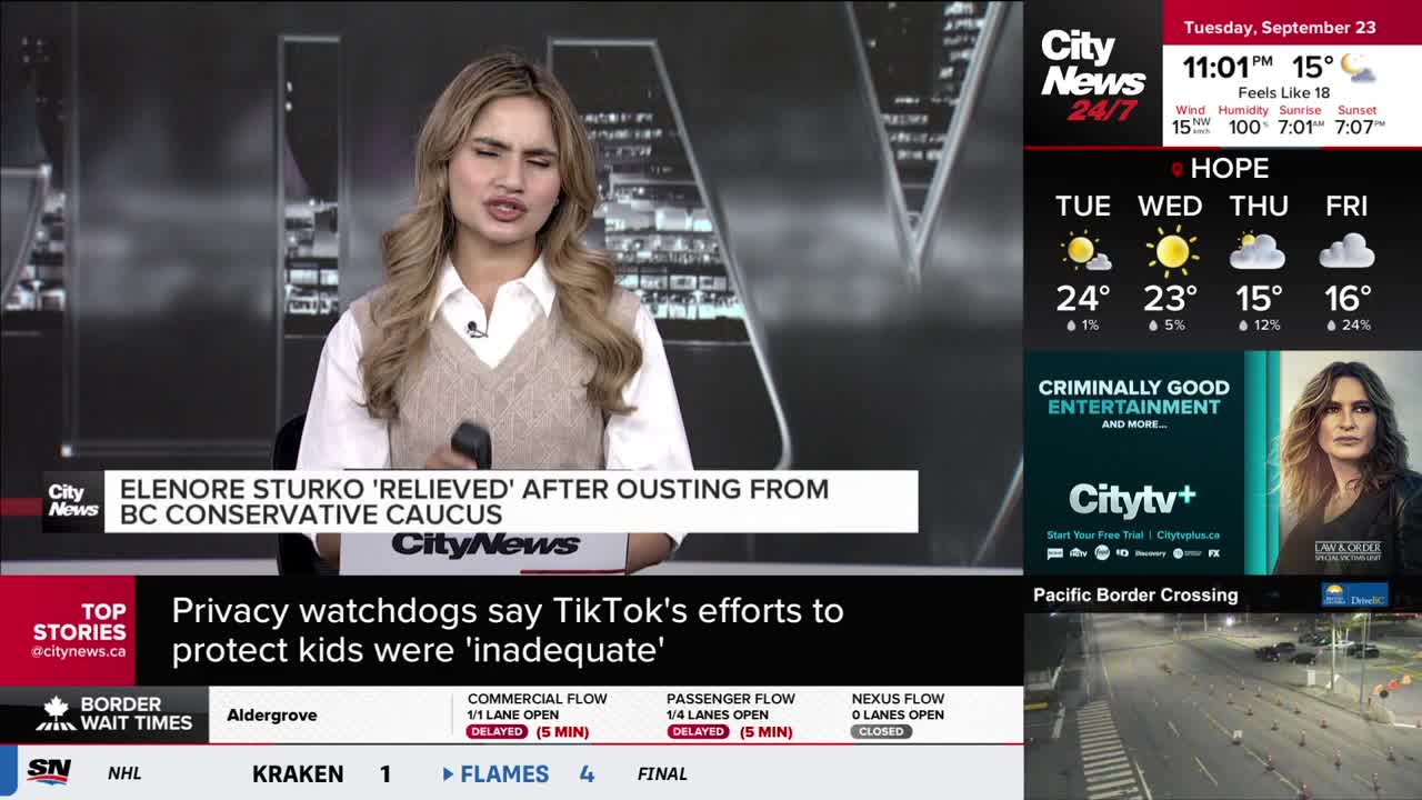 A CityNews Vancouver anchor is speaking, holding a microphone and looking towards the camera. Graphics about weather, border wait times, and other news stories are displayed on the screen around her.
