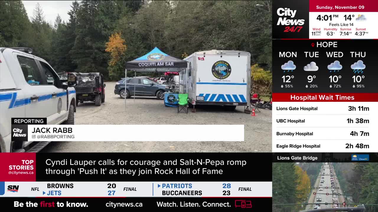 A white trailer with a Coquitlam Search and Rescue logo is parked, and a tent is set up nearby. A CityNews Vancouver reporter is on the scene, with a police vehicle and a utility vehicle in the background.
A white trailer with a Coquitlam Search and Rescue logo is parked, and a tent is set up nearby. A CityNews Vancouver reporter is on the scene, with a police vehicle and a utility vehicle in the background.