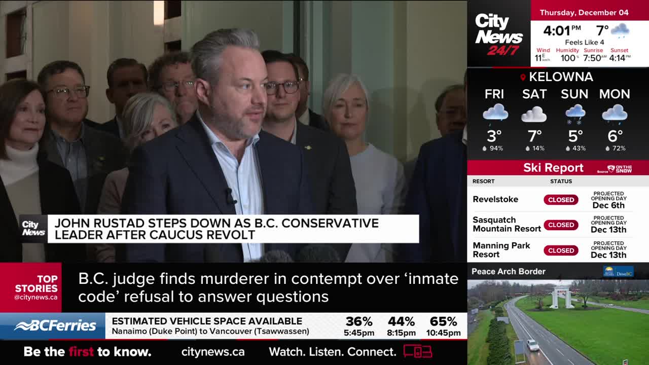 John Rustad, the B.C. Conservative leader, is speaking to a crowd, the CityNews Vancouver graphic says he's stepping down. Behind him, a group of people stand listening, their faces a mix of expressions.
