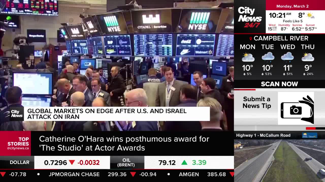 Traders in suits cluster around screens displaying stock tickers and the NYSE logo. A CityNews Vancouver chyron reports that global markets are on edge after an attack on Iran. Traders in suits cluster around screens displaying stock tickers and the NYSE logo. A CityNews Vancouver chyron reports that global markets are on edge after an attack on Iran.