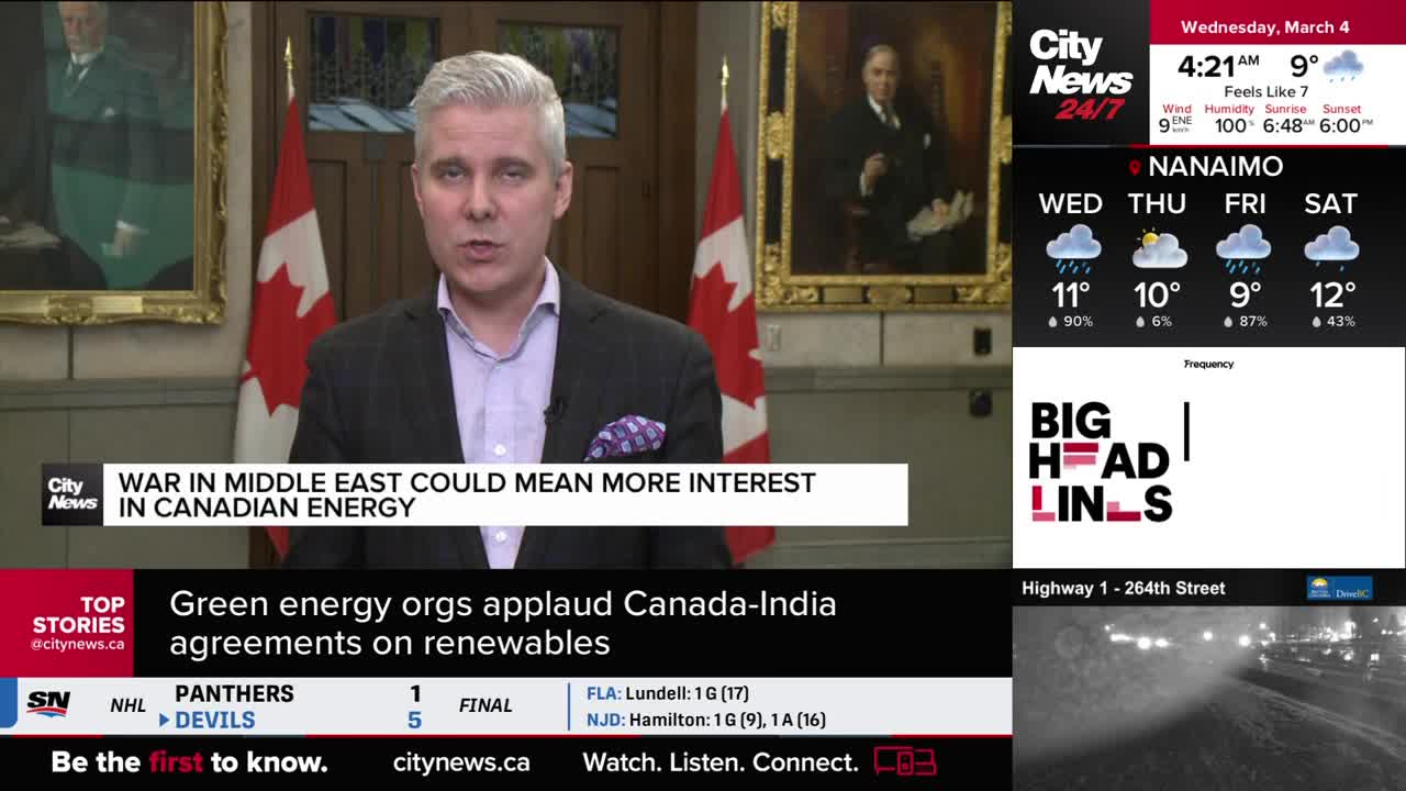 A man in a suit stands before Canadian flags, speaking about the Middle East war and its impact on Canadian energy. On the right, the CityNews Vancouver broadcast displays weather forecasts for Nanaimo and a traffic camera view of Highway 1.