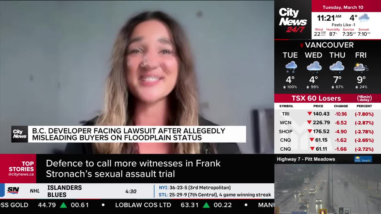 A woman is speaking on a screen, with news headlines about a B.C. developer and a sexual assault trial playing out beside her. The Vancouver weather forecast shows rain for Tuesday and Wednesday.