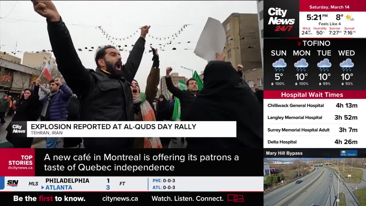 A man with his arms raised in the air shouts during a rally in Tehran, Iran. CityNews Vancouver is reporting on the event. A man with his arms raised in the air shouts during a rally in Tehran, Iran. CityNews Vancouver is reporting on the event.