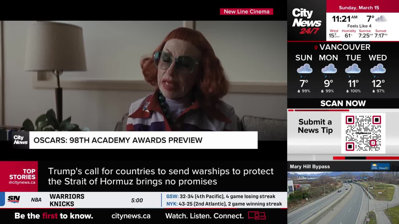 A person with bright red hair and heavy makeup is on screen, discussing the Oscars. The CityNews Vancouver weather forecast shows rain for Sunday and Monday. A person with bright red hair and heavy makeup is on screen, discussing the Oscars. The CityNews Vancouver weather forecast shows rain for Sunday and Monday.