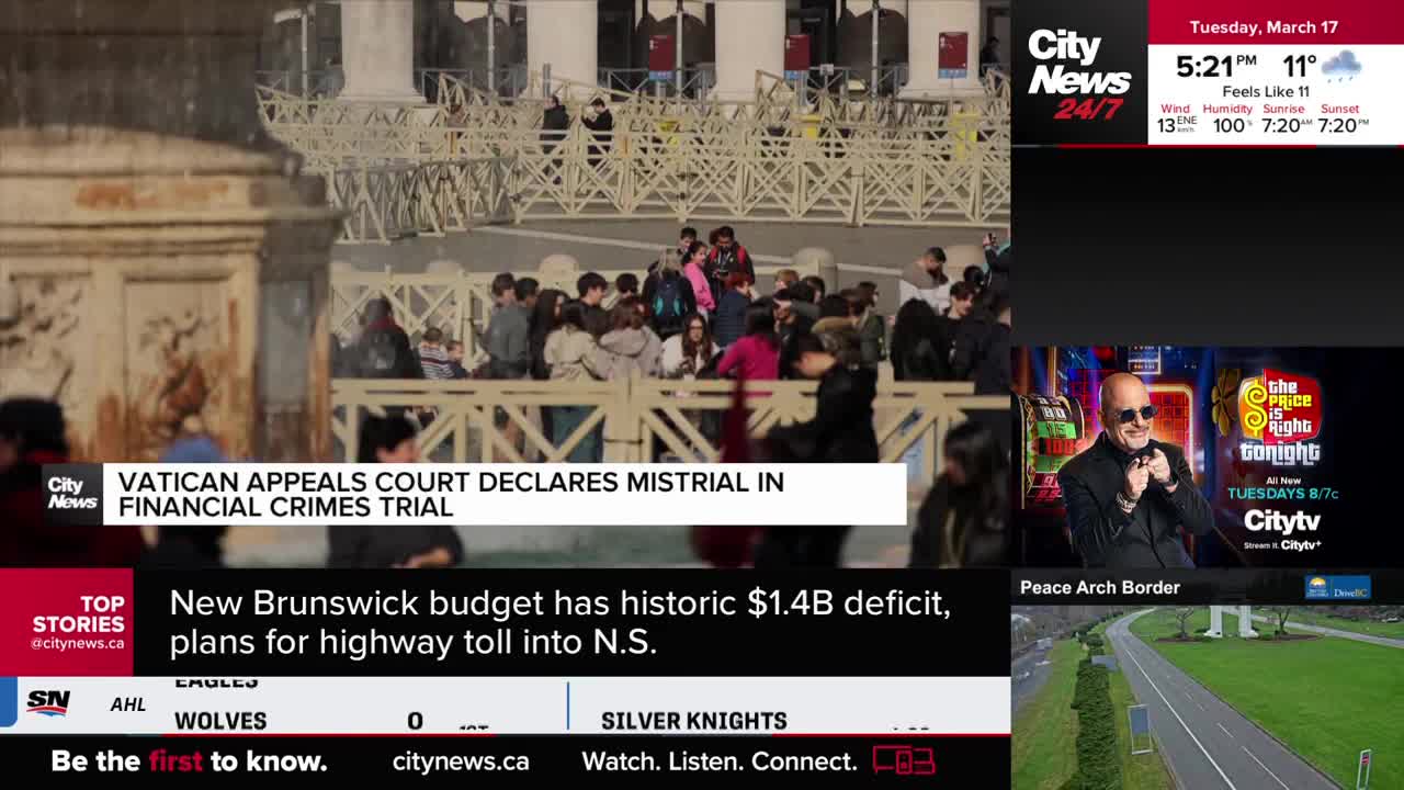 A crowd gathers behind barriers, a news ticker announces a mistrial in a Vatican financial crimes trial. CityNews Vancouver reports on a New Brunswick budget with a historic deficit and plans for a highway toll.