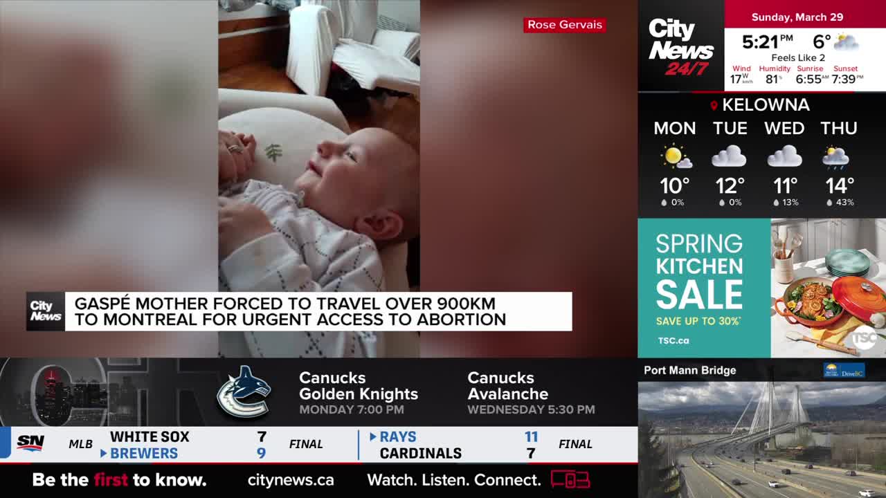 A baby laughs as they lie on a soft surface, their tiny hands reaching out. A headline across the bottom of the screen states a mother from Gaspé had to travel over 900 kilometers to Montreal for urgent access to abortion.