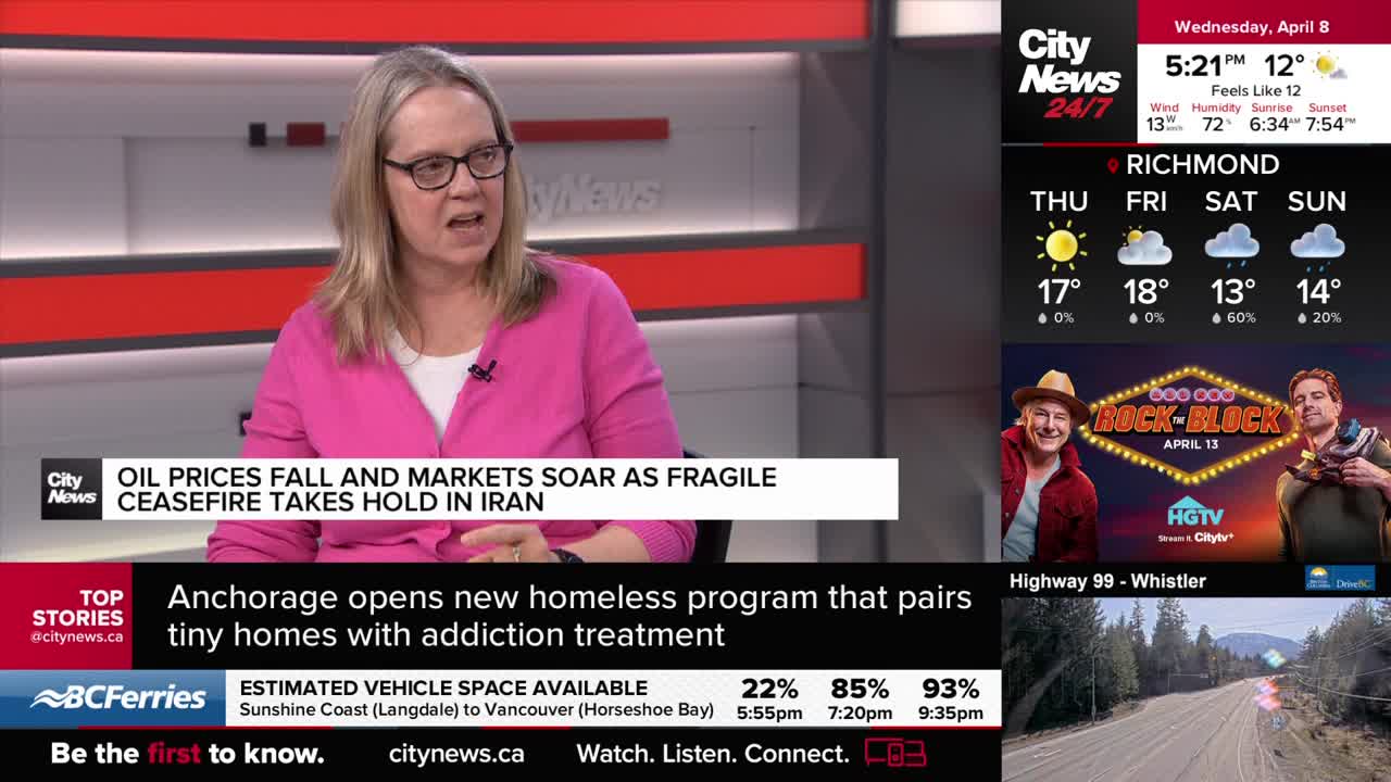 A woman in a pink cardigan speaks in front of a CityNews Vancouver backdrop. Below her, headlines flash, including one about oil prices and another about a new homeless program in Anchorage.