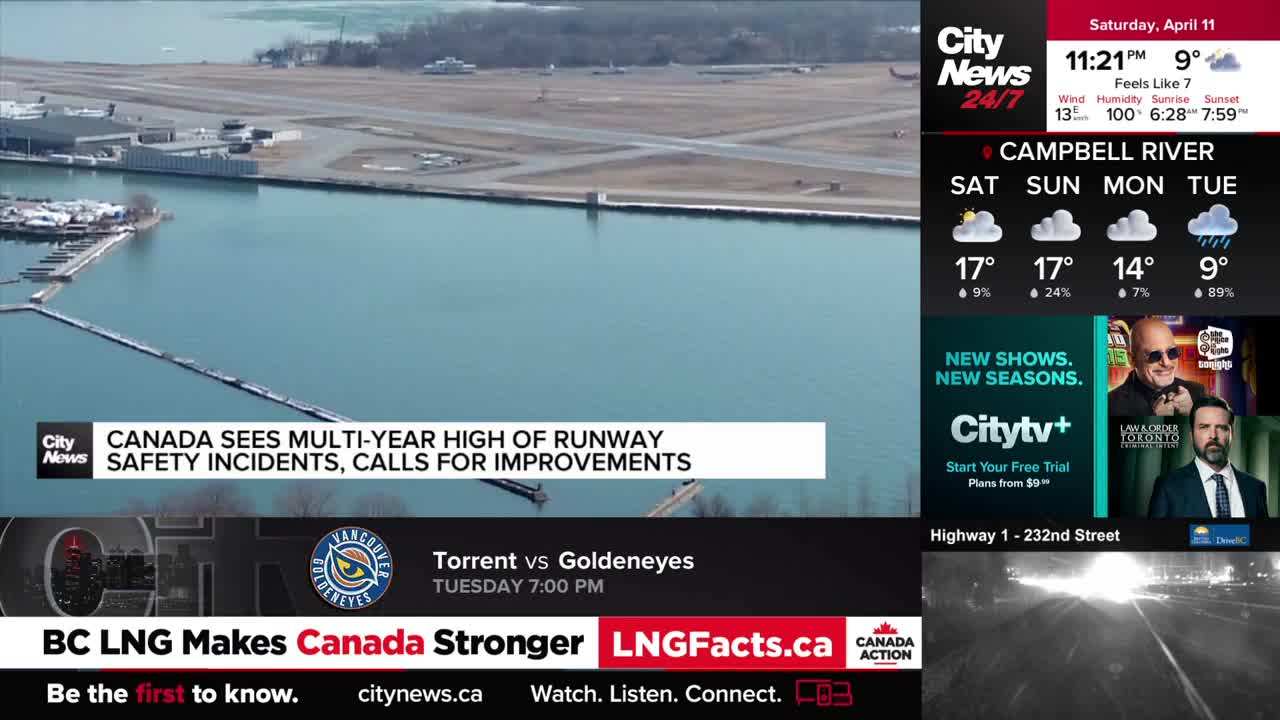 An airplane taxis on a runway beside a large body of water. A news ticker scrolls across the bottom of the screen, announcing "BC LNG Makes Canada Stronger."