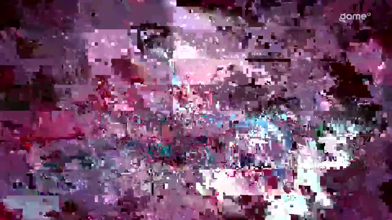 The screen is glitching, with the image breaking into a mosaic of pink, purple, and blue squares. The Game+ logo is barely visible in the top right corner.
