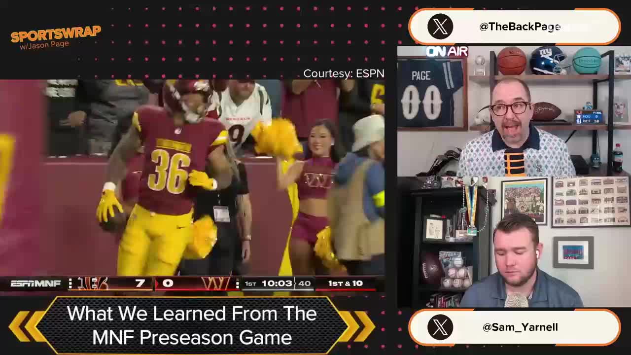 The running back in burgundy and gold, number 36, is heading towards the end zone, ball tucked securely. A cheerleader with yellow pom-poms is smiling and cheering as the play unfolds.

