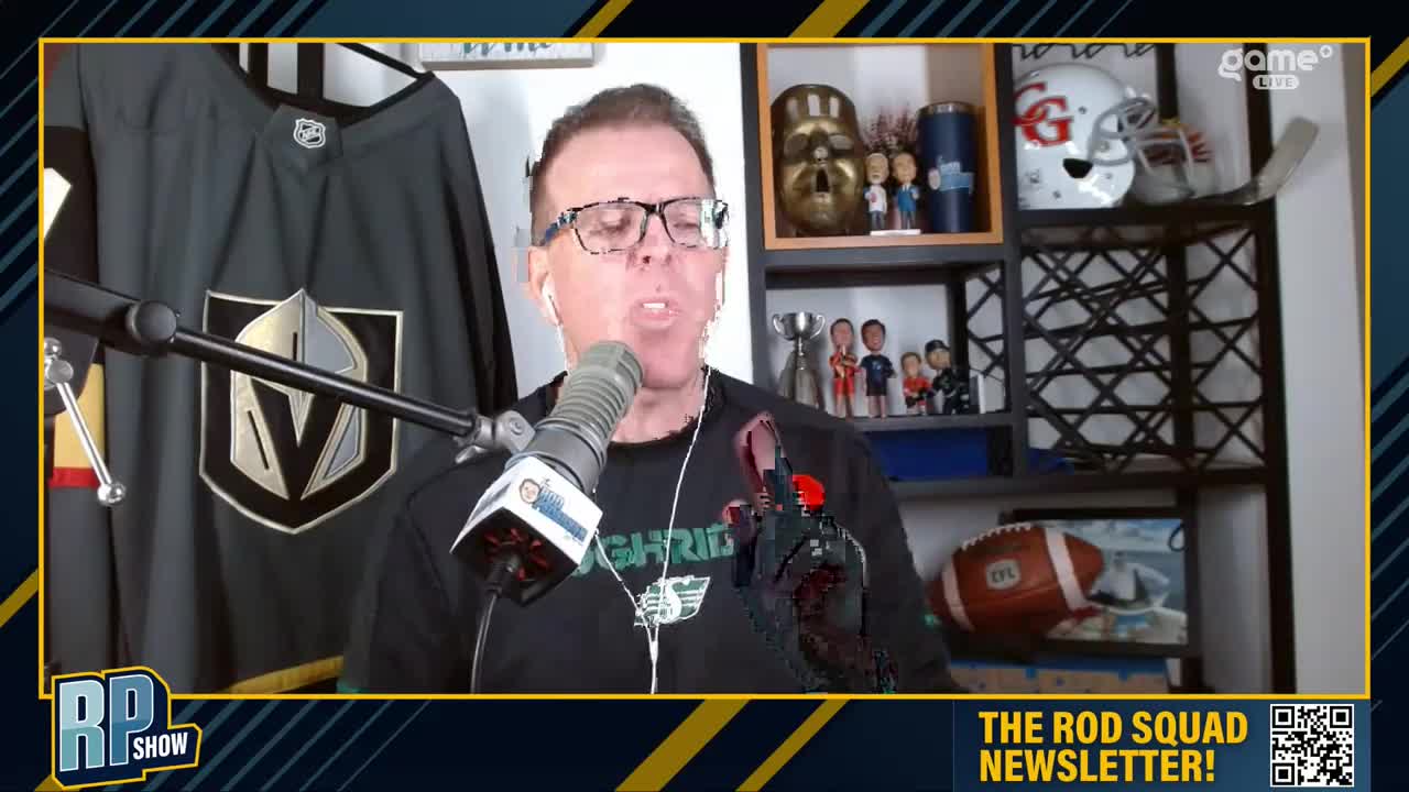 A man in glasses speaks into a microphone, likely discussing sports on the Game+ channel. Behind him, a Vegas Golden Knights jersey hangs, and a shelf displays sports memorabilia.
