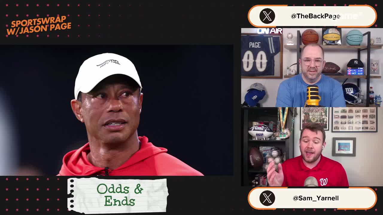 Tiger Woods, wearing a red hoodie and white cap, looks intently to his left. On the right, two men are on a video call, one in a blue shirt and the other in a red shirt, discussing something.