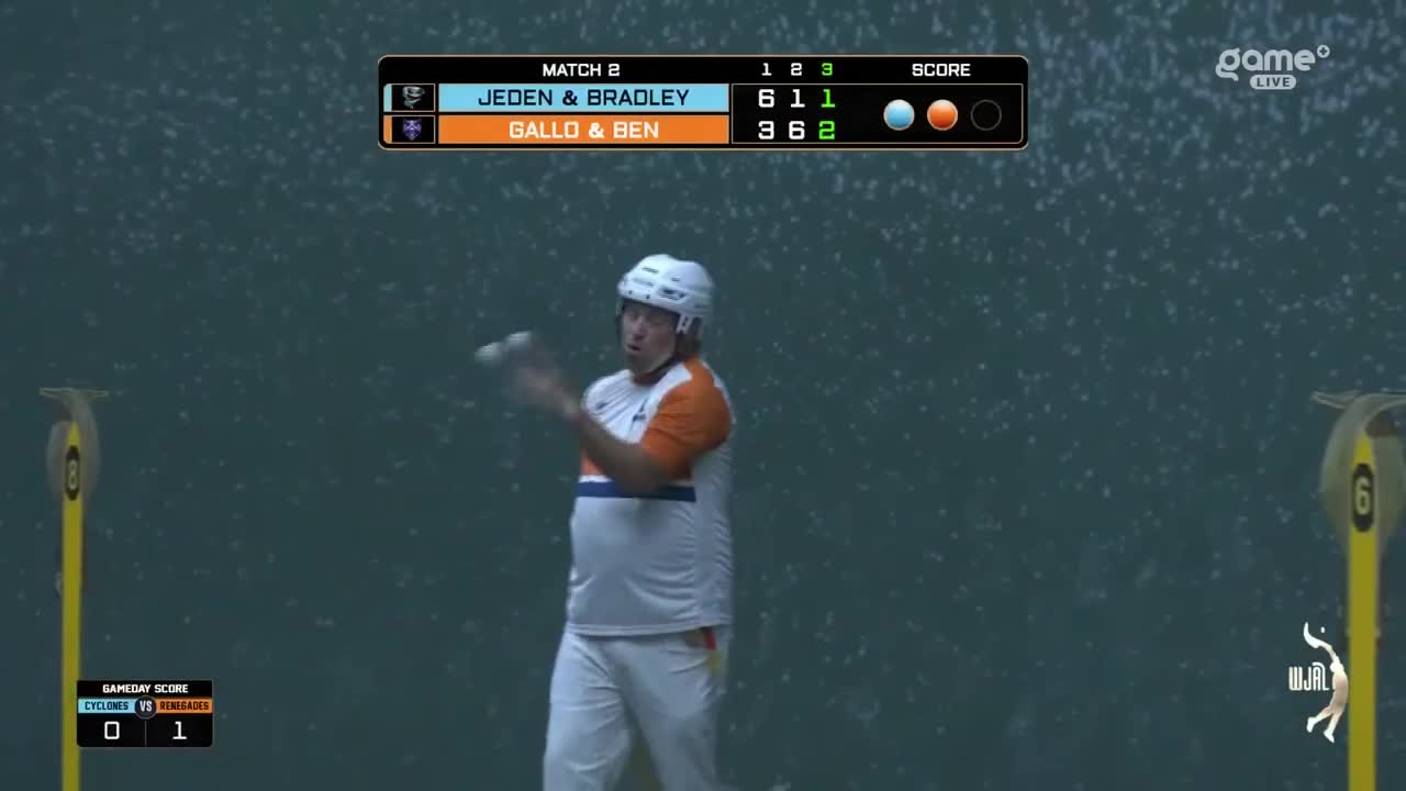 A player in a white helmet and orange and white uniform prepares to strike a ball. The score for Match 2 shows JEDEN & BRADLEY leading GALLO & BEN.