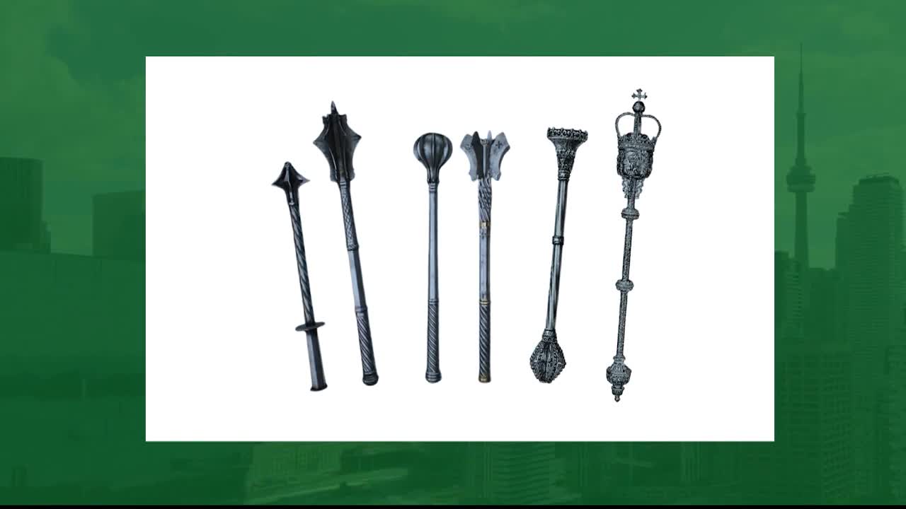 Six ceremonial maces, including the one used in the Legislative Assembly of Ontario, stand in a row against a white background. The Toronto skyline, including the CN Tower, provides a backdrop.
