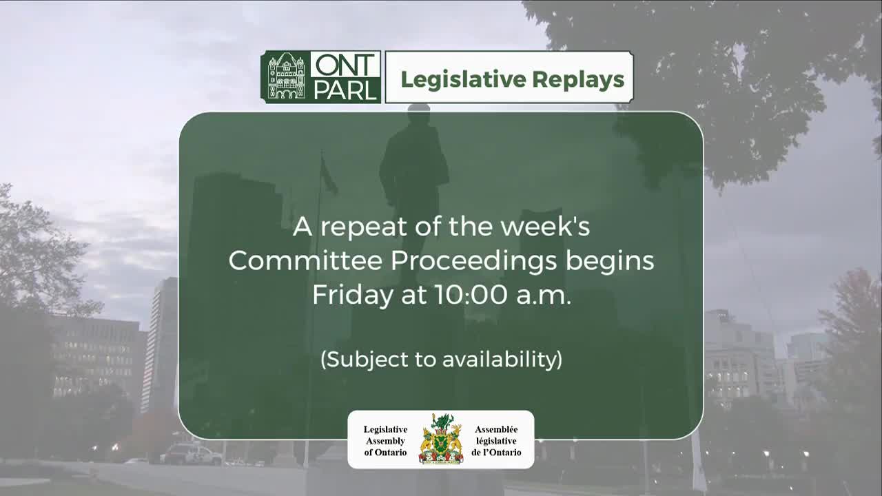 A green-tinted information screen, likely from the Legislative Assembly of Ontario, displays a notice about committee proceedings replays. The text is set against a backdrop of a statue and a cloudy sky.

