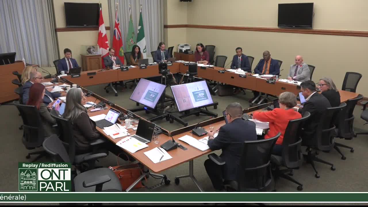 At the Legislative Assembly of Ontario, a group sits around a large, square table. The Canadian and Ontario flags stand behind them as they review documents and look at screens.
At the Legislative Assembly of Ontario, a group sits around a large, square table. The Canadian and Ontario flags stand behind them as they review documents and look at screens.
