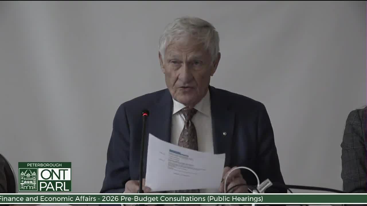 A man in a navy suit, speaking into a microphone, holds a sheet of paper. The Legislative Assembly of Ontario's Finance and Economic Affairs committee is in session.
A man in a navy suit, speaking into a microphone, holds a sheet of paper. The Legislative Assembly of Ontario's Finance and Economic Affairs committee is in session.