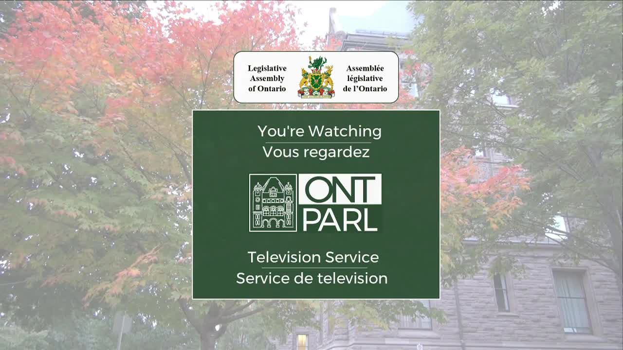 A green screen announces "You're Watching" in both English and French, with the Legislative Assembly of Ontario's logo in the corner. Behind the text, autumn leaves and a stone building are visible.
A green screen announces "You're Watching" in both English and French, with the Legislative Assembly of Ontario's logo in the corner. Behind the text, autumn leaves and a stone building are visible.