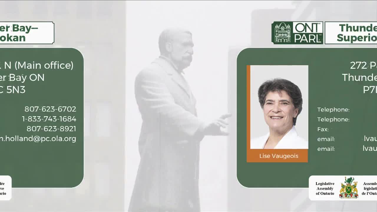 A large, faded statue of a man in a suit stands behind two green panels. One panel displays contact information for an office in Thunder Bay, Ontario, while the other shows a photo and details for Lise Vaugeois.